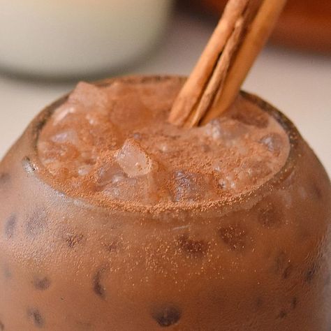 Alexa Soto on Instagram: "Chocolate Frio Mexican iced chocolate Save , share and tag your people! Let's make cacao our new caffeine drink in the AM 😌 just as the indigenous people of Mesoamerican cultures did Dress from @shopdoen 🤍 Glassware is an old candle from @alcachofayromero 🕯 Serves 1 •1 1/2 tablespoons cacao powder (I used @colibrihealing cacao) •1 cinnamon stick (broken into pieces) •1/2 cup filtered water •1 cup non dairy milk of choice (I recommend oat milk) •Small pinch of s Iced Chocolate, Caffeine Drinks, Non Dairy Milk, Non-dairy Milk, Old Candles, H Hotel, Filtered Water, Indigenous People, Secret Law Of Attraction