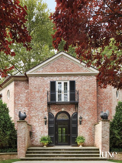 Delano & Aldrich conceived this grand red-brick home in Bronxville in 1930. When designer Melissa Lindsay and architect Michael Baushke arrived for its latest incarnation, restoring it accurately—but with a view to modern living—was the brief. Red Brick Exteriors, Red Brick House, Architecture Home, Curved Staircase, Luxe Interiors, Home Tours, Interiors Design, Red Bricks, Exterior Brick