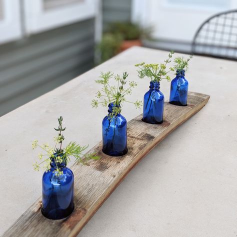 Not just for tea lights! Our Barrel Stave Candle Holders also look great with bud vases. Change it up with the seasons! Wine Barrel staves have such an elegant and characteristic arc that adds architectural interest. Great wedding or holiday gift! Barrel Staves Ideas, Barrel Stave Ideas, Wine Stave Projects, Wine Barrel Stave Projects, Mantel Living Room, Wine Stave Candle Holder, Bourbon Barrel Stave Projects, Stave Projects, Stave Wine Racks