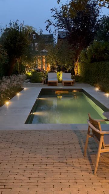 ROSEBANK on Instagram: "A perfect spot for a late night swim. A serene and tranquil pool in a Richmond garden with planting of soft grasses and spears of verbena. #rosebanklandscaping #grasses #verbena #outdoorpool #pool #outdoorlighting #poollighting #richmond #gardendesign #landscapedesign" Late Night Swim, Pool At Night, Night Swim, Swimming Pool Lights, Modern Outdoor Living, Pool Lights, Night Swimming, Outdoor Living Design, Pool Light