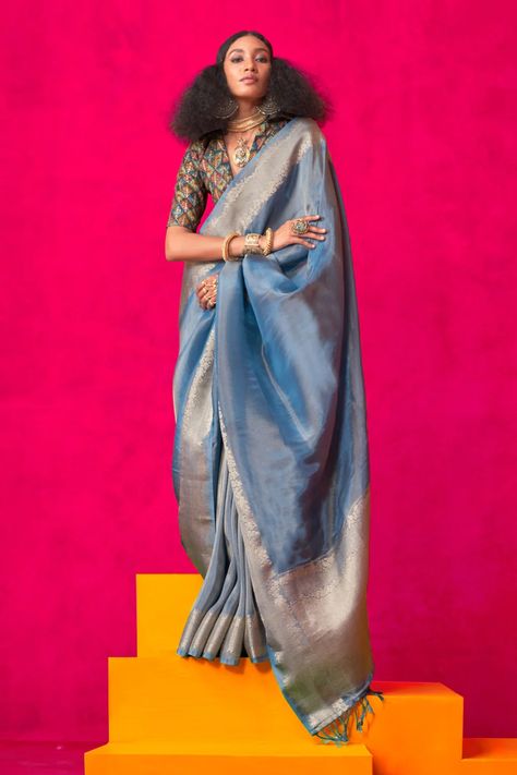 Elegance meets luxury in the Blue Pearl Tissue Silk Saree! ✨ Sheer, lightweight, and shimmering with silk and zari—perfect for weddings and festive celebrations. Tissue Sarees, Tissue Silk Saree, Tissue Saree, Blue Pearl, Silk Saree, Silk Sarees, Saree, Festival, Silk