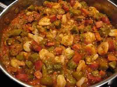 Smothered Okra Tomatoes with Shrimp Recipe. A wonderful Cajun recipe filled with shrimp, tomatoes, okra, Cajun seasonings and more! Spanish Okra Recipes, Okra And Tomatoes With Shrimp, Shrimp Creole With Okra, Orka And Tomatoes With Shrimp, Okra And Shrimp Recipes, Shrimp And Okra Recipes, Cajun Okra, Okra And Shrimp, Smothered Okra