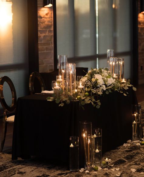 A perfect symphony of Romance & Elegance 🤍 Black Candles For Wedding, Candle Centerpieces Wedding Black Table Cloth, Black Tablecloth Wedding Greenery, Candle Centerpieces Wedding Goth, Candle Lit Reception, Black Lit Candles In Tlne Dark, Candlelit Wedding, Black Tablecloth, Happy Flowers