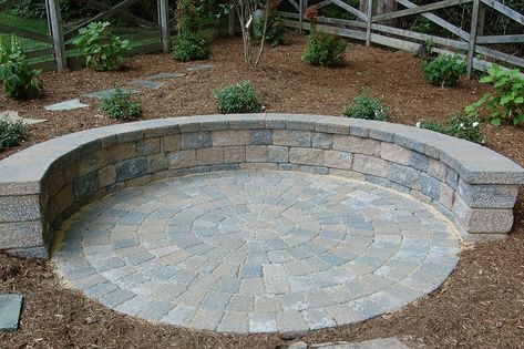 Circular paver patio with a segmental retaining wall (SRW) sitting wall. Retaining Wall Bench, Sitting Wall, Circular Patio, Building A Retaining Wall, Wall Bench, Patio Wall, Wall Seating, Falls Church, Retaining Walls