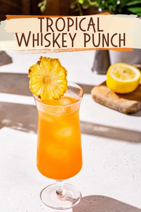 The Tropical Whiskey Punch is such a delicious summer cocktail! A mix of rye whiskey with pineapple, passion fruit and Aperol, it’s perfect on a hot summer day. It’s super easy to mix up and so tasty! This drink is great for anything from casual sipping on the patio to a tropical summer cocktail party! Whiskey Punch, Best Whiskey Cocktails, Mixing Cocktails, Whiskey Cocktails Easy, Rye Cocktails, Punch Drink, Yummy Summer Cocktails, Apple Whiskey, Best Whiskey