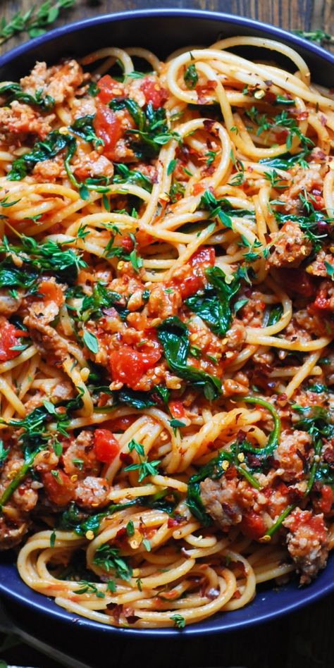 Italian Sausage Spaghetti in a blue bowl. Pork Sausage Spaghetti, Sausage Spinach Spaghetti, Quick Italian Sausage Recipes, Spicy Sausage Spaghetti, Spagetti And Sausage, Italian Sausage Meat Sauce, Spaghetti Recipes Italian Sausage, Spaghetti With Sweet Italian Sausage, Ground Italian Sausage Recipes Gluten Free