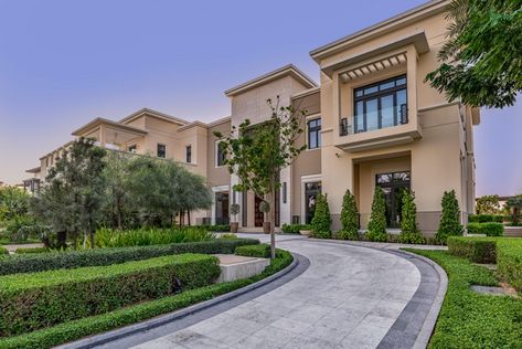 This sprawling Contemporary Arabesque mansion covers 26,693 sq ft on a plot of more than 42,000 sq ft. The home encompasses seven bedrooms, multiple living areas and a stunning backyard. Regal and elegant, this living room presents beautiful high-end finishes, plenty of space and abundant natural light. #DubaiHillsmansion #mansion #dubaihills Dubai Hills, Dubai Houses, Dubai Architecture, Dubai Luxury, Design Your Own Home, Mansions For Sale, Mansions Luxury, Real Estate Houses, Luxury Property