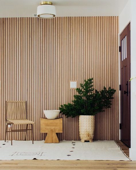 Anita Yokota on Instagram: “I can't get enough of using wall paneling to upgrade blank walls! This client home waited for so long and now the panels are finally…” Japandi Accent Wall, Diy Home Updates, Modern Eclectic Home, Accent Wall Designs, Wood Slat Wall, Elegant Vases, California Casual, Wood Panel Walls, Slat Wall