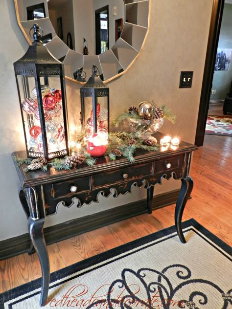 Christmas Decorating (like they do in the magazines) | Redhead Can DecorateRedhead Can Decorate Hobby lobby lanterns Christmas Entryway, Navidad Diy, Christmas Lanterns, Entryway Table, Lanterns Decor, Green Lantern, Christmas Deco, Christmas Joy, Cozy Christmas