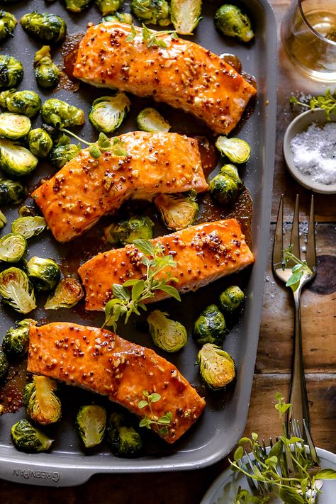 Healthy and quick. Juicy salmon filets rubbed with a supple maple dijon sauce and baked with Brussels sprouts for a simple and tasty one-pan weeknight fixture. Salmon And Brussel Sprouts Sheet Pan, Brussel Sprouts Maple Syrup, Salmon Brussel Sprouts, Salmon And Brussel Sprouts, Maple Dijon Salmon, Dijon Salmon, Dijon Sauce, Salmon Filets, Vegetarian Crockpot Recipes