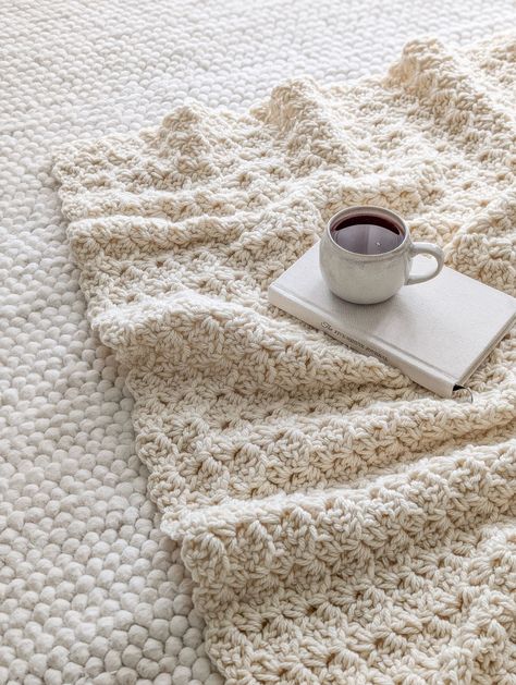 A chunky weight crochet blanket with a hot cup of tea. Easy Two Color Crochet Blanket, Large Hook Crochet Blanket, One Row Repeat Crochet Blanket, Crochet Lose Stitches, Crochet Blanket Pattern For Beginners, Caron Spice Cakes Crochet Patterns, Blanket Yarn Blanket Patterns, Crochet Blanket 4 Weight Yarn, Quickest Crochet Blanket