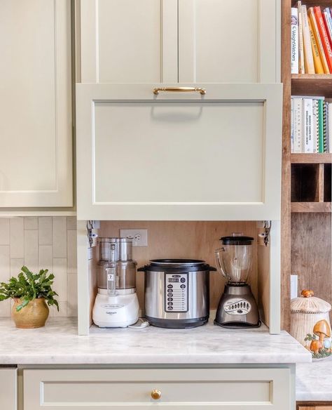 Who is not a fan of the appliances out on the counter-top? 🙋‍♀️ The vertical cabinet door lift is a great storage solution. The cabinet goes down to the counter-top. A simple lift of the door and you can bring out your appliance to use. 
.
Inspired By: @ashmorebuilders 

#appliancestorage
#appliances
#appliancegarage
#kitchenstorage
#storagesolutions
#kitchenorganization
#organization
#beorganized 
#kbis
#organize Counter Pantry Cabinet, Appliance Nook Kitchen, Kitchen Countertop Hidden Storage, Kitchen Cabinet Hidden Storage, Hidden Storage Kitchen Cabinets, Vertical Lift Cabinet Door, Kitchen Countertops With Appliances, Appliance Caddy Cabinet, Small Appliances Cabinet