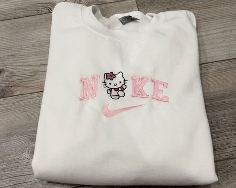 Hello Kitty Nike Sweatshirt, White Hello Kitty Print Sweatshirt For Streetwear, Y2k Hello Kitty Print Crew Neck T-shirt, Hello Kitty Nike, White Crew Neck T-shirt With Hello Kitty Print, White Hello Kitty Print Crew Neck T-shirt, Cute Hello Kitty Print Crew Neck Sweatshirt, Air Force Hoodie, Sanrio Clothes