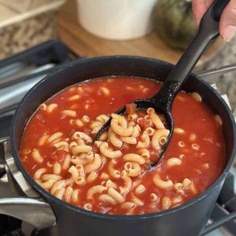 A pot of macaroni and tomatoes. Ground Beef And Macaroni Tomato Soup, Macaroni And Tomato Sauce, Mac And Tomatoes, Tomato And Macaroni, Macaroni And Tomato Juice, Macaroni And Tomatoes Recipe, Tomatoe Macaroni Soup, Macaroni And Tomatoes Old Fashioned, Macaroni Tomato Soup