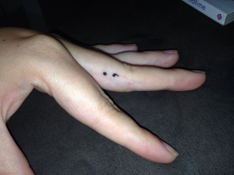 Mini tatt. Finger tattoo. Semicolon. My finger by Katie O'Brien (aka Madam_ink_86) @ Scorpion Tattoo, North lakes. Semi Colon Finger Tattoo, Semi-colon Snake Tattoo, Semi-colon Tattoo Ideas Finger, Snake Semi-colon Tattoo Ideas, Semi-colon Tattoo Side Wrist, Hidden Semi-colon Tattoo Ideas, Ring Finger Tattoos, Scorpion Tattoo, Finger Tattoos