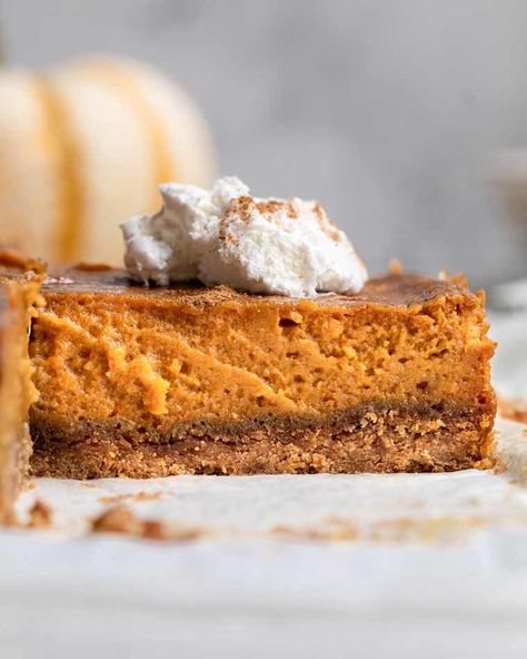 Pumpkin pie was traditionally reserved for fall, but you can enjoy it year round. The taste of a spiced pumpkin-based custard hits a spot that nothing else can. This recipe for pumpkin pie bars gives you that same distinct pumpkin pie flavor, with a delicious gluten-free, grain-free crust. They can be cut into any size to enjoy whenever you get a craving for that pumpkin flavor. Plus, they are elegant enough to serve at the afternoon tea or evening book club. Pinky's up! Gluten Free Pumpkin Pie Bars, Healthy Pumpkin Pie Recipe, Gluten Free Pumpkin Pie, Freeze Sweet Potatoes, Healthy Pumpkin Pies, Easy Bar Recipes, Potato Bar, Dairy Free Pumpkin, Pumpkin Pie Cheesecake