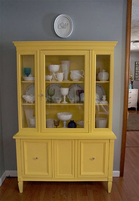 I'm excited to share my first ever china cabinet makeover! I figured we could use some sunny yellow right about now, in the midst of drea... Yellow China Cabinet, Antique China Cabinet Makeover, Antique China Cabinet, China Cabinet Redo, China Cabinet Makeover, Diy Furniture Makeover Ideas, Painted China Cabinets, Antique China Cabinets, White Furniture Living Room