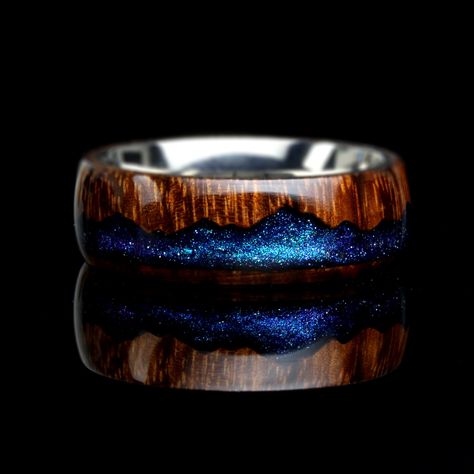 "NATURAL WOOD FIRE OPAL RING * Waterproof and durable sold rose wood * Type of ring: Wedding Band * Fit: Comfort fit * Titanium ring core makes ring sturdy and durable. Each ring is hand carved, sanded and polished. 💕 HOW TO ORDER 💕 * Please type your engraving information in the \"Add your personalization\" box ★ example ★ Font Name: playball Engraving: I love you (We can engrave up to 25 characters including spaces) 💕 RETURN POLICY 💕 * Please be advised that customized or engraved items are not returnable or exchangeable. * If you are not sure about the ring size, then please place an order Without Engraving. We can exchange the ring if it is not engraved. Once you get the right sized ring we can engrave the ring.  International customer  Custom may charge an import duty on the inter Nontraditional Mens Wedding Rings, Mountain Wedding Ring Men, Gemstone Wedding Band Men, Mens Wedding Rings Wood, Mens Titanium Ring, Mens Wedding Bands Wood, Wood Wedding Rings, Mens Unique Wedding Bands, Mens Engagement Ring