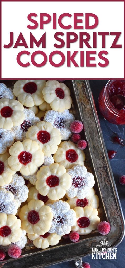 This recipe combines two very popular types of Christmas cookies - a spritz cookie and a thumbprint cookie! The base is slightly sweet and buttery and makes a great vessel for filling with a holiday spiced homemade jam. Spiced Jam Spritz Cookies are slightly crumbly, but not dry, and paired with the spices in the jam, these cookies are extraordinarily special! #spiced #cookies #christmas #spritz #press #jam Jam Butter Cookies, Preppy Kitchen Cookies, Spring Spritz Cookies, Old Fashioned Spritz Cookies, Christmas Spritz Cookies Recipes, Lemon Spritz Cookies, Christmas Jam Cookies, Pampered Chef Spritz Cookies Recipe, Pressed Cookies Recipe