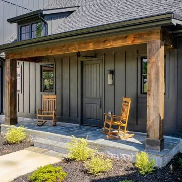 75 Beautiful Black Board and Batten Exterior Home Pictures & Ideas - July, 2021 | Houzz Classic Home Exterior, Home Exterior Design, Board And Batten Exterior, Cabin Exterior, Exterior Home, Casa Exterior, Exterior Remodel, House Siding, Inviting Home