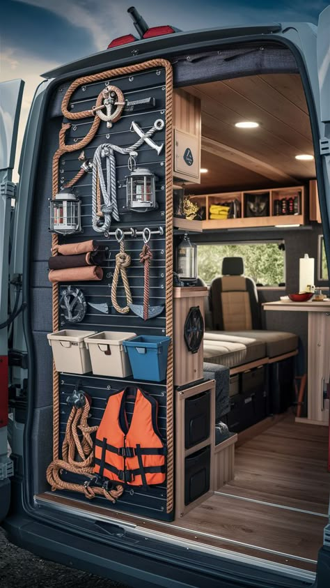 A nautical-themed gear wall with marine-inspired storage and table flips in an adventure van. Table Flips, Van Organization, Gear Wall, Table Flip, Rv Motorhomes, Van Storage, Adventure Van, Storage Systems, Cargo Van