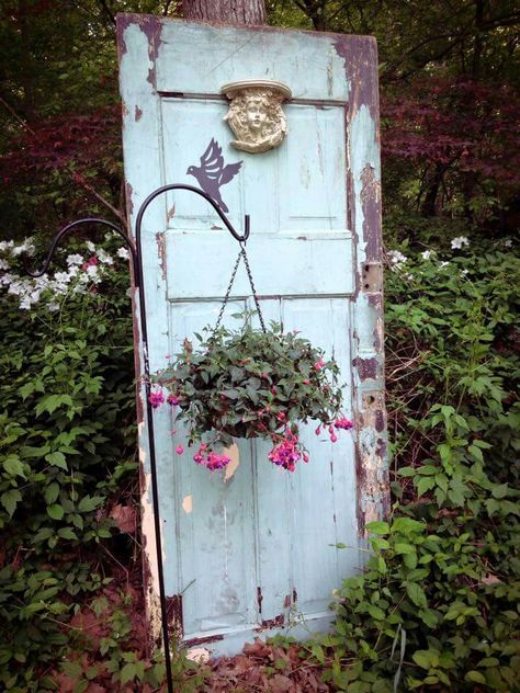 Upcycle Doors Garden, Garden Decor With Old Doors, Hanging Old Doors On The Wall, Garden Shed Out Of Old Doors, Hanging Antique Door, Secret Garden Door, Old Door Decor, Barn Door Projects, Old Chandelier