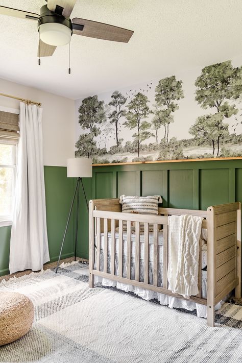 A baby boy nursery gets a woodland themed makeover with deep green, cozy lighting, and peel & stick watercolor style wall mural on a budget. Green And Grey Nursery, Nursery Makeover, Green Painted Walls, Nursery Accent Wall, Cozy Lighting, Board And Batten Wall, Baby Room Inspiration, Baby Boy Room Nursery, Green Nursery