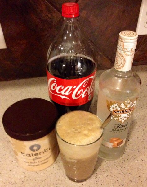 Caramel Vodka Float  2 shots Caramel Vodka Fill glass to 1/2 with Coke Add Talenti Sea Salt Caramel Gelato to fill  This is Amazing!!!  My girlfriend Kate's idea. I wish I could take the credit. Kissed Caramel Vodka Recipes, Pinnacle Salted Caramel Vodka Recipes, Kahlua And Coke, Smirnoff Kissed Caramel Vodka Recipes, Stoli Salted Caramel Vodka Recipes, Salted Caramel Gelato, Caramel Vodka, Sea Salt Caramel, Salted Caramel