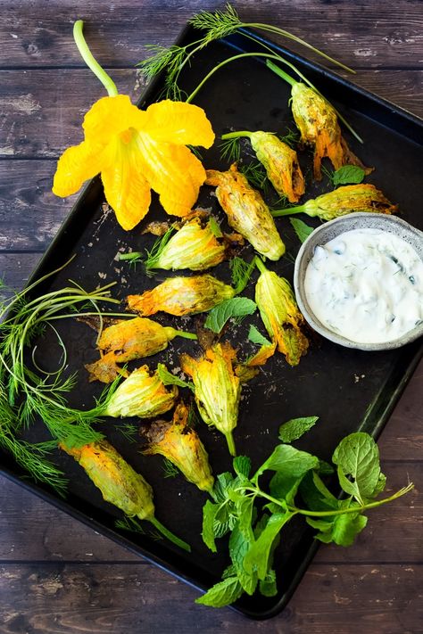 Baked Stuffed Squash Blossoms (Dolmas Style!)with ground lamb, basmati rice and fragrant Middle Eastern spices- a simple delicious main course or appetizer, inspired by the season! #dolmas #squashblossom #zucchiniblossom #squashblossoms #stuffedsquashblossom #baked #lamb #lambrecipes #groundlamb via @feastingathome Stuffed Squash Blossom, Vegetarian Zucchini Recipes, Stuffed Squash Blossoms, Easy Delicious Appetizers, Zucchini Recipes Baked, Best Zucchini Recipes, Feasting At Home, Stuffed Squash, Easy Zucchini Recipes