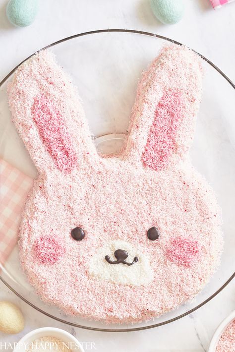 This post shows step by step how to make this Easter Bunny Cake. Also, it includes a free printable rabbit cut-out pattern for this cute cake. Cake For Bunny, Cake With Bunny Rabbit, Easy Bunny Cake Decoration, Birthday Cake Bunny Rabbit, Bunny Cake Pan, Black Frosting, Bunny Carrot, Baking Quotes, Rabbit Eating