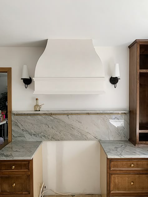 Scones Next To Range Hood, Plaster Hood Between Windows, Plaster Finish Range Hood, Sconces Flanking Range Hood, Plastered Range Hoods, Plaster Oven Range Hood, Kitchen Hood With Sconces, Bell Hood Kitchen, Plaster Hoods Kitchen