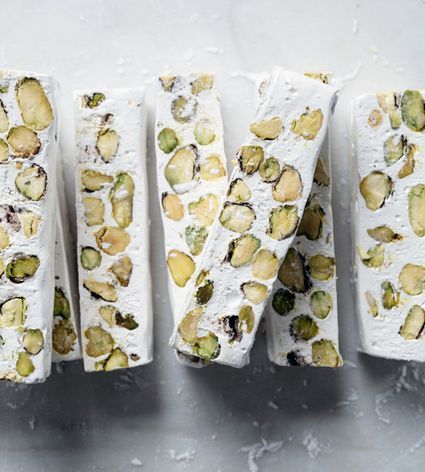 This traditional nougat recipe features the flavors of pistachios and delicate rosewater. These chewy treats are easy to make in your own kitchen. Aran Goyoaga, Pistachio Nougat, Nougat Recipe, Nougat Candy, Candied Fruits, Pistachio Recipes, Arabic Sweets, Turkish Food, Homemade Candies