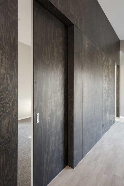 Interior wall designs using 9 splendid materials to enrich the space | Building and Interiors Black Stained Plywood Wall, Stained Plywood Walls, Black Stained Plywood, Ply Walls, Plywood Wall Paneling, Cabin Makeover, Black Plywood, Stained Plywood, Plywood Wall