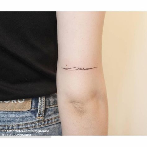 Fine line waves tattoo located on the tricep. Fine Line Wave Tattoo Ideas, Line Waves Tattoo, Line Water Tattoo, Fine Line Lake Tattoo, Wavelength Tattoo, Waves Fine Line Tattoo, Water Line Tattoo, Wave Tattoo Fine Line, Line Wave Tattoo