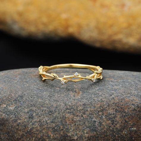 Twist Wedding Band, Minimalist Twisted Ring, Dainty Yellow Gold Ring, Twig Half Eternity Band, Delicate Leaf Ring, Anniversary Ring Women ⚒️The ring is made by hand and crafted to perfection. You can choose from silver, gold plated, or different karat gold like 10k, 14k and 18k, and the 10k, 14k and 18k ones are made of real solid gold. There's a stamp inside each ring showing its karat for authenticity. 📜𝐒𝐏𝐄𝐂𝐈𝐅𝐈𝐂𝐀𝐓𝐈𝐎𝐍𝐒 𝐒𝐭𝐨𝐧𝐞 Type: Moissanite/Lab Diamond/Natural Diamond Weight: 0.024ct (approx.) Quantity: 3 Shape: Round Color: D-E-F/G-H Clarity: VVS-VS/VS-SI 𝐌𝐞𝐚𝐬𝐮𝐫𝐞𝐦𝐞𝐧𝐭𝐬 Shank Width: 1.2mm Profile Thickness: 1.0mm ♻️𝐑𝐞𝐭𝐮𝐫𝐧𝐬 & 𝐄𝐱𝐜𝐡𝐚𝐧𝐠𝐞𝐬 Our top priority is to make sure our customers are happy. If you don't like the item you got, you can return Gold Vine Wedding Band, Simple Wedding Bands For Women Gold, Minimal Wedding Band, Twig Wedding Band, Twist Wedding Band, Leaf Collection, Simple Wedding Bands, Twisted Ring, Flower Mound