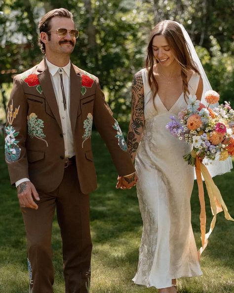 colorful + embroidered wedding suits and groom style: a 2024 wedding trend to watch Non Traditional Wedding Outfit Grooms, Wedding Statement Pieces, Eclectic Groom Attire, Colored Wedding Suits Men, Embroidered Wedding Suit Men, Unusual Groom Attire, Funky Wedding Suits Men, Unique Men’s Wedding Outfit, Edgy Wedding Suit