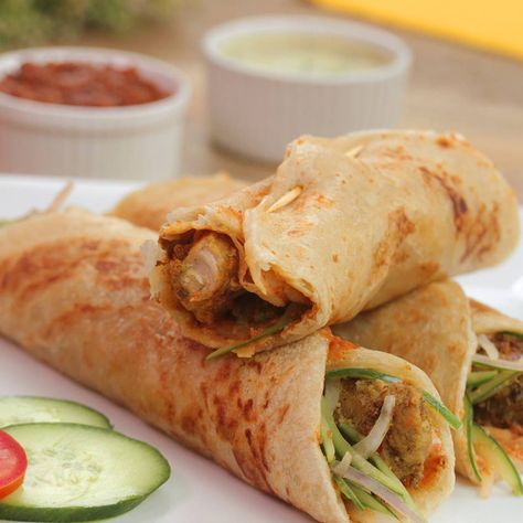 Chicken Malai Boti Roll Recipe By SooperChef | Scrumptious Chicken Malai Boti Roll Recipe Written Recipe: http://bit.ly/2QmLUtO Chicken Malai Boti Roll Recipe is easy to make and wonderful in taste.... | By SooperChef Paratha Roll Recipe, Paratha Roll, Chicken Malai, Vegetable Pakora, Malai Chicken, Ramzan Recipe, Chicken Pakora, Popcorn Chicken Recipe, Wonton Recipes