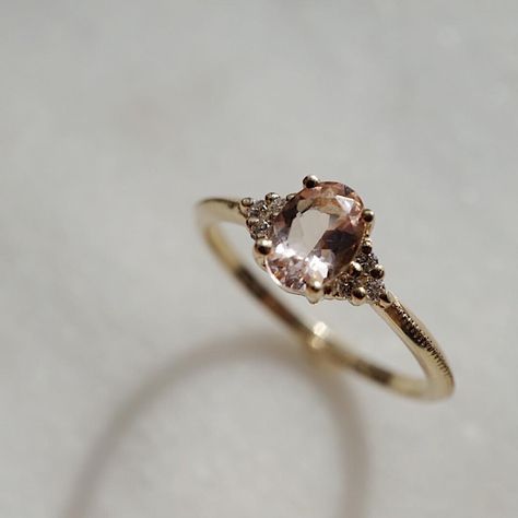 Foe & Dear on Instagram: “✨💞✨ Perfectly peach oval morganite in our Beau setting with a subtle milgrain detail on the band. Bespoke engagement ring for A from D.…” Oval Morganite Wedding Ring With Rose Cut Diamonds, Blush Morganite Ring With Prong Setting, Oval Morganite Rings In Pink Gold, Oval Morganite Ring In Pink Gold, Blush Morganite Oval Jewelry, 50k Followers, Rose Gold Engagement Ring Vintage, Viking Wedding, Peach Morganite