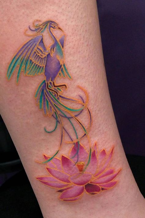 36 Beautiful Lotus Tattoos (Design & Meaning - 2021 Guide) – IdeasDonuts Lotus And Bird Tattoo, Lotus Flower With Phoenix Tattoo, Orange Lotus Flower Tattoo, Pheonix Tattoo With Lotus, Fire Lotus Tattoo, Lotus Flower Watercolor Tattoo, Phoenix Lotus Tattoo Feminine, Hummingbird Lotus Tattoo, Phoenix And Lotus Flower Tattoo