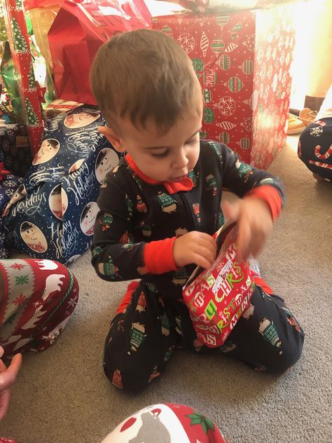 Opening his presents all by himself Kids Opening Christmas Presents, Christmas Gift Opening, Christmas Gift Ideas For Toddlers, Opening Christmas Presents, Gift Ideas For Toddlers, 2nd Christmas, Fake Gifts, Opening Presents, Learning And Growing