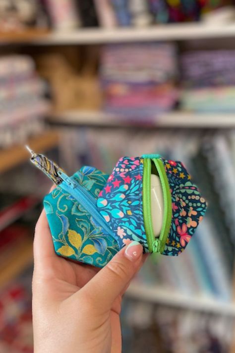 Find a super handy tutorial on how to make your own Airpods case over on our KnitandStitchClub Airpod Case Diy Sewing, Fabric Airpod Case, Sew Airpod Case, Airpod Case Sewing Pattern, Airpod Case Pattern, Diy Airpods Case, Textiles Projects, Cute Sewing Projects, Fabric Diy