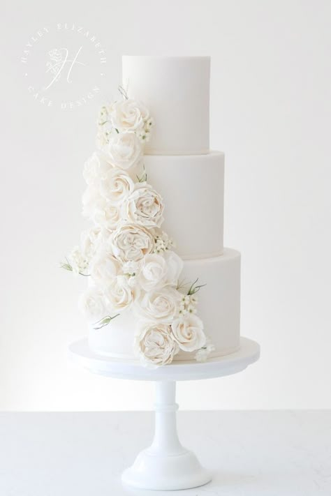 Buttercream White Wedding Cake, Romantic Wedding Cake 3 Tier, All White Wedding Cake With Flowers, Modern 4 Tier Wedding Cake, White Wedding Cake White Flowers, Simple Wedding Cake White Roses, White Wedding Cake With Roses, Plane White Wedding Cake, Four Tier Wedding Cakes Elegant