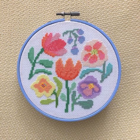 "Bring some happiness with this colourful flower hoop design. A counted cross stitch pattern and instructions for you to stitch a beautiful design for your home or as a thoughtful gift for a loved one Size of the design: The design is 72 stitches high and 73 stitches wide. The size depends on the count of aida that you choose to stitch on. The design in the photo is stitch on 14 count aida and fits perfectly in a 6\" hoop If you stitched it on 11 count aida it would be a 7\" hoop and 16 count ai Wedding Cross Stitch, Easy Cross Stitch Patterns, Graphic Floral, Colourful Abstract, Abstract Graphic, Beautiful Cross, Cute Cross Stitch, Floral Cross Stitch, Screen Free