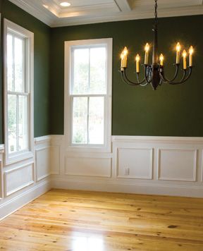 White Panelling Green Walls, Dark Green Walls With White Wainscoting, Green Walls With White Wainscotting, Green Walls White Paneling, White And Green Panelling, Wood Wainscoting Dining Room, Green Chair Rail Bedroom, Dark Chair Rail, Green Wainscoting Living Room