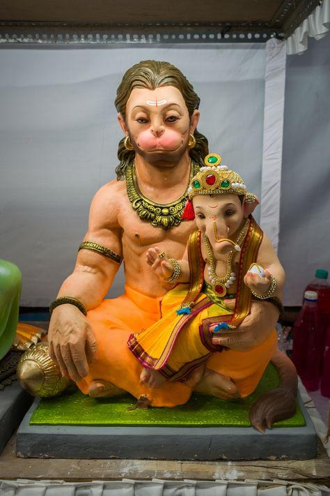 A cute idol of Lord Hanuman and Ganesha at a workshop during Ganesh Chaturthi 2019 in Mumbai. Download this photo by Sonika Agarwal on Unsplash Hanuman Ji And Ganesh Ji Together, Hanuman And Ganesha Together, Hanuman And Ganesh, Ganpati Photography, Ganesh Chaturthi Greetings, My Friend Ganesha, New Krishna, Ganesh Chaturthi Wishes, Bajrangbali Hanuman