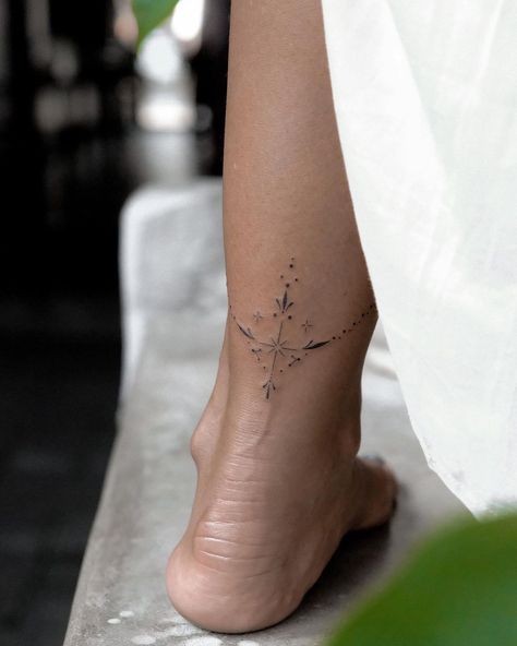 Lotus with moon 🌙 | Instagram Tattoos Around Ankle, Back Of The Ankle Tattoo, Ornamental Ankle Tattoo, Ankle Tattoos For Women Classy, Tattoo Around Ankle, Side Foot Tattoos, Inner Ankle Tattoos, Wrap Around Ankle Tattoos, Back Of Ankle Tattoo