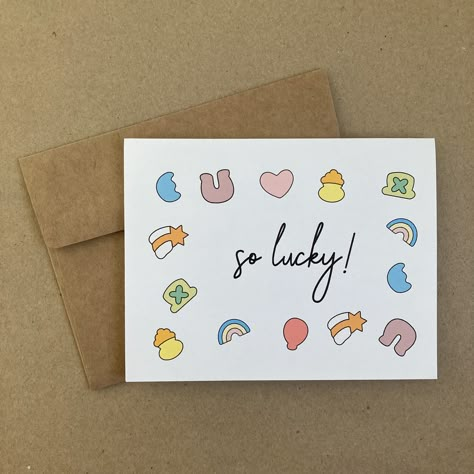 This single-folded greeting card has colorful shapes scattered around text that reads, "So Lucky!" The inside of the card is blank.  Each card purchased comes with one brown kraft envelope.  Card dimensions: 4.25" wide by 5.5" tall Envelope dimensions: 5.75" wide by 4.375" tall Free shipping is available however tracking is included is not scanned accurately at the time of delivery. If you would like to be able to accurately track your order, please select an upgraded shipping option at check-ou Random Cards For Friends, Cute Card Sayings, Cute Simple Card Ideas, Pun Greeting Cards, Handmade Thank You Card, Good Luck Card Ideas, Punny Valentines Day Cards, Good Luck Cards Handmade, Cute Cards Diy