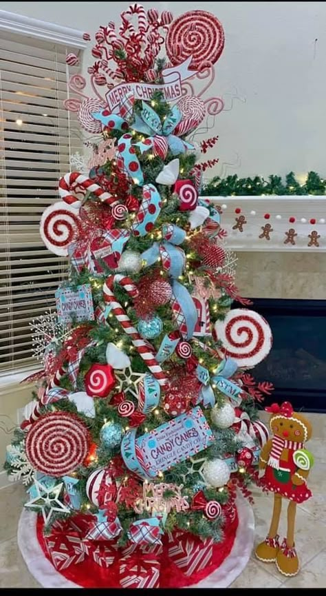 Big Christmas Tree Ornaments, Christmas Candy Tree Ideas, Peppermint Decorations Diy, Sweet Treats Christmas Tree, Santa Tree Ideas, Candy Trees Christmas, Candy Christmas Tree Ideas, Big Ornaments On Tree, Sweets Christmas Tree Theme