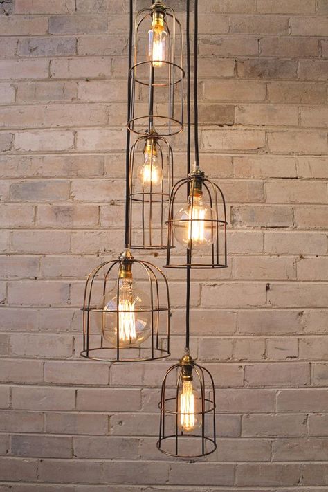 Cage Light Chandelier, Industrial Lighting Diy, Rustic Industrial Lighting, Diy Industrial Lighting, Stairwell Lighting, Vintage Industrial Lighting, Cage Light, Industrial Style Lighting, Industrial Livingroom