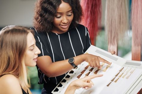 Woman choosing hair dye from the catalog | Premium Photo #Freepik #photo V34 Colour Corrector, Colour Corrector, Whitening Teeth, Salon Pictures, Wear Red Lipstick, Perfect Teeth, Yellow Teeth, Red Polka Dot Dress, Photo Woman